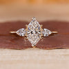 Dutch marquise diamond ring pear side stones three stone.
