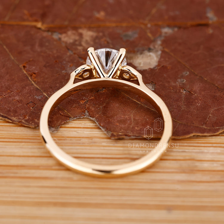 Cathedral setting round diamond ring design.