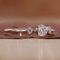 Minimalist round diamond ring compass prong set.
