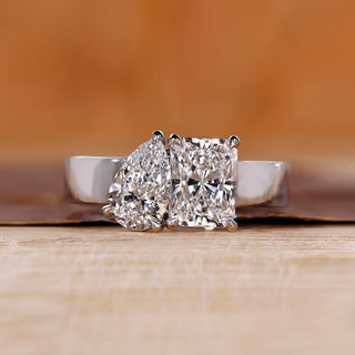 Toi et Moi diamond ring with radiant and pear cut diamonds.
