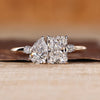 Pear and radiant cut ring toi et moi split shank style.
