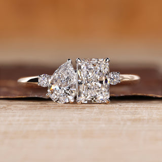 Pear and radiant cut ring toi et moi split shank style.
