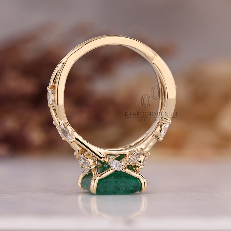 Asscher emerald ring marquise stones nature style set.

