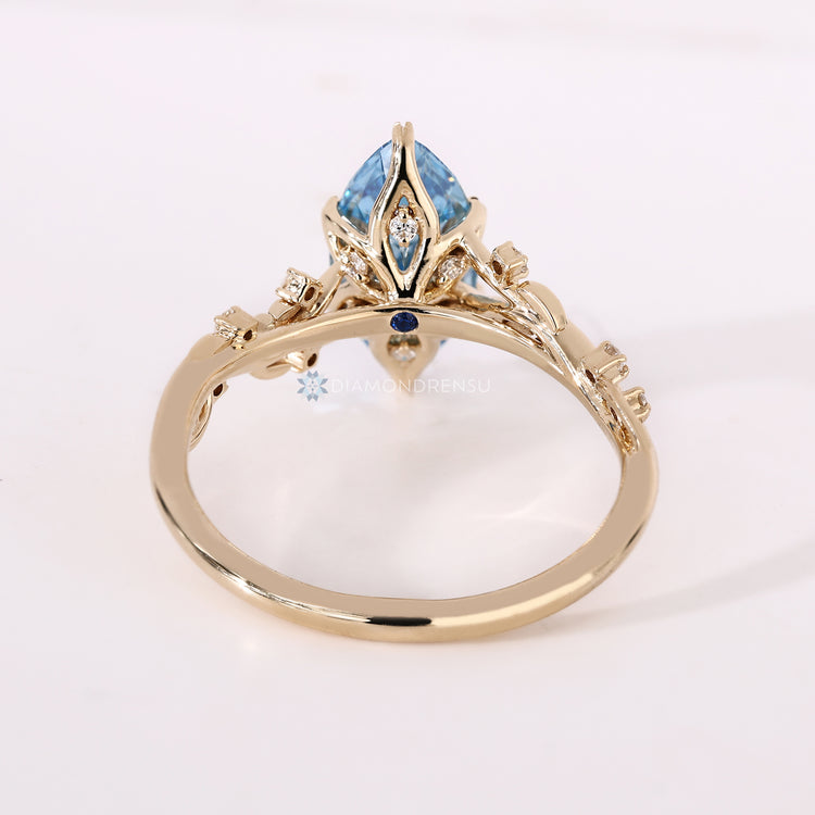 Handmade nature inspired marquise diamond ring.