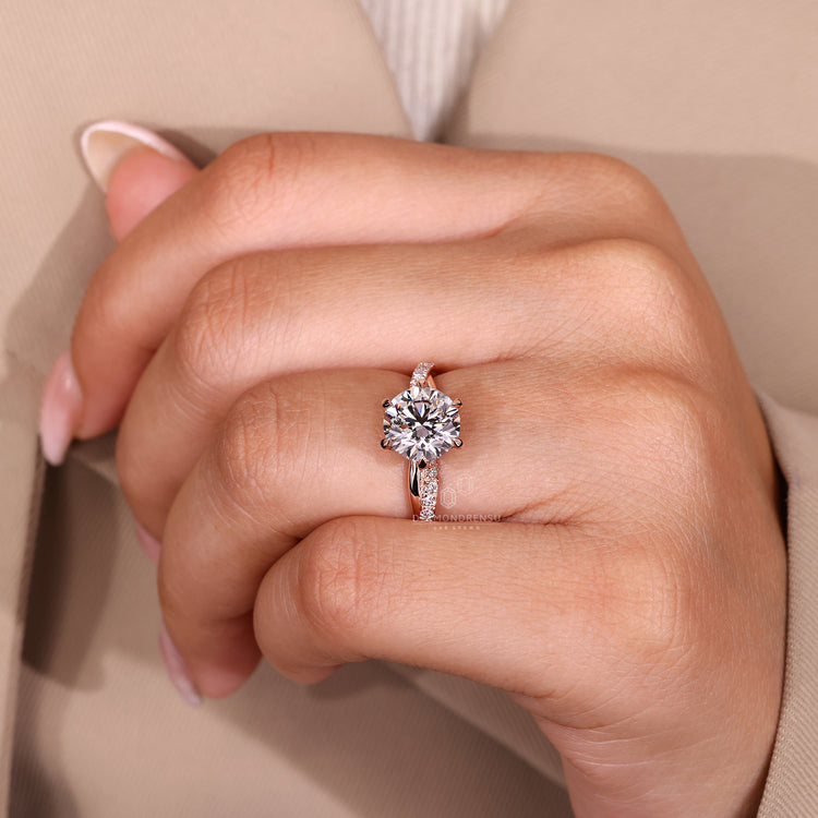 Handmade round cut diamond ring twisted pave style.