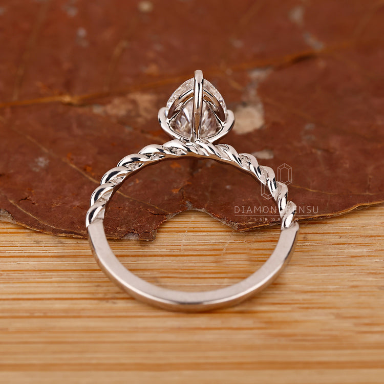 IGI certified marquise diamond ring compass prong.
