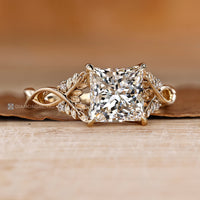 Princess diamond ring with round cut side diamonds.