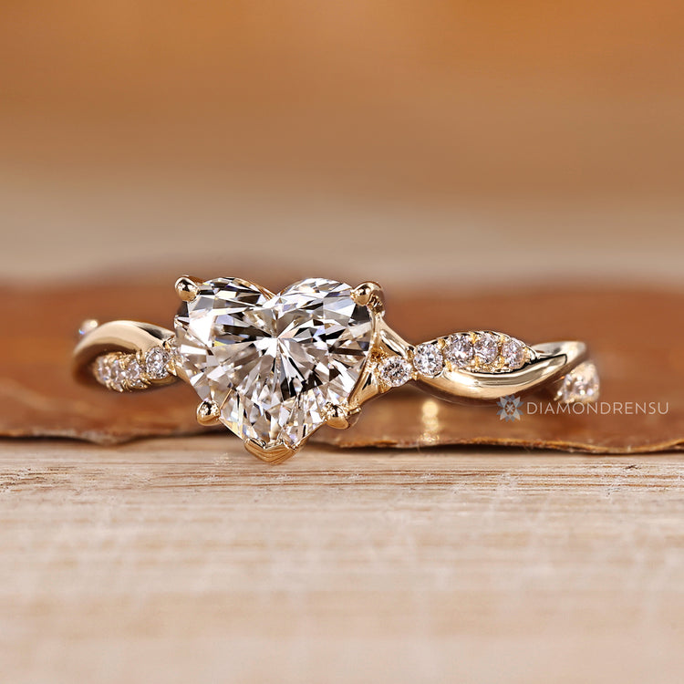 Lab grown heart diamond ring with twisted pave.