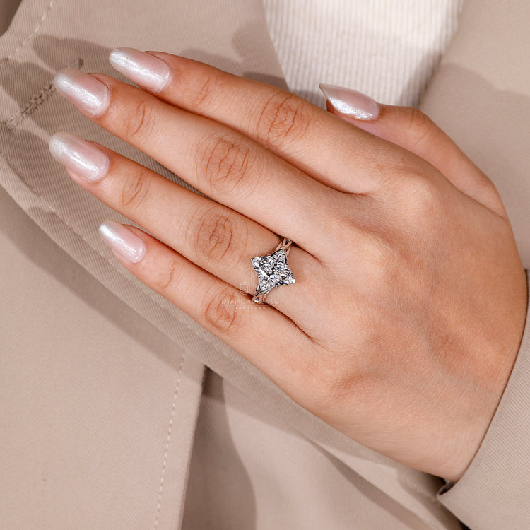 Seven stone diamond ring with V prong setting.
