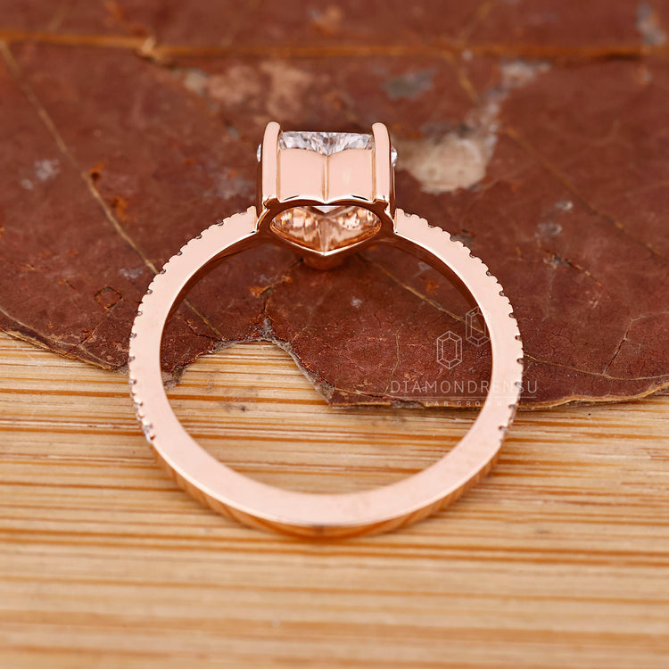 Lab grown diamond heart cut ring with V prong detail.
