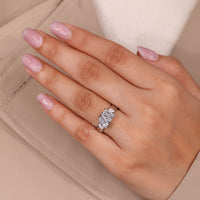 Two stone diamond ring with claw prong setting.
