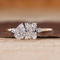 Lab grown pear radiant ring toi et moi two stone.

