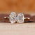 Toi et moi ring emerald oval diamond two stone set.
