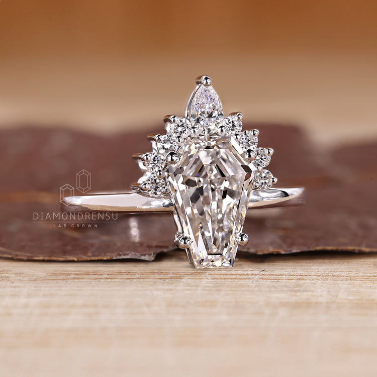 Coffin ring half halo prong setting style.