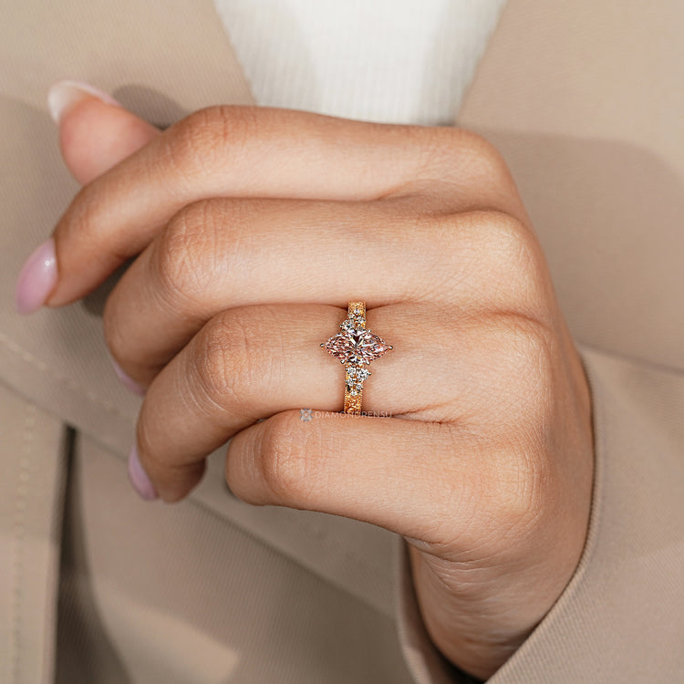 Marquise diamond ring with six claw prong setting.