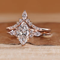 Marquise diamond bridal set with stackable wedding band.