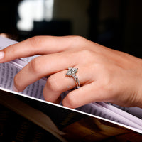 Marquise diamond ring with Muse setting and tapered shank.