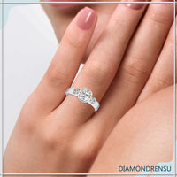 2ct cushion cut diamond ring with a unique and elegant three stone design.
