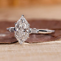 Claw prong marquise diamond engagement ring.
