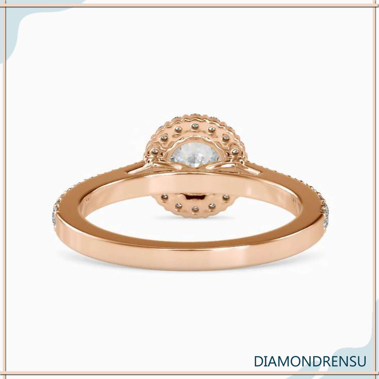 Halo diamond engagement ring showcasing a stunning round cut diamond.
