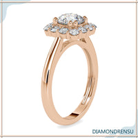 Round cut diamond engagement ring with an elegant halo.

