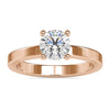 Simple Round Solitaire Ring with a classic basket setting for timeless elegance.