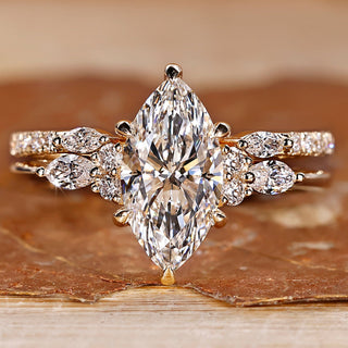 Marquise diamond bridal set with round side stones.