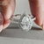round cut diamond halo ring with White gold band.
