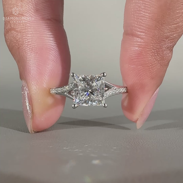 Princess diamond ring pave round diamond split shank.
