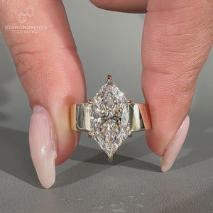 Dutch marquise engagement ring with tapered shank.