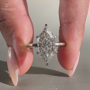 hidden halo diamond ring in white gold ring setting.
