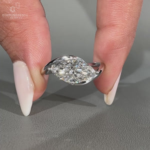 Marquise Cut Diamond Ring in a white gold bypass setting.
