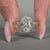 Tapered shank engagement ring crafted in yellow gold with elegant detail.
