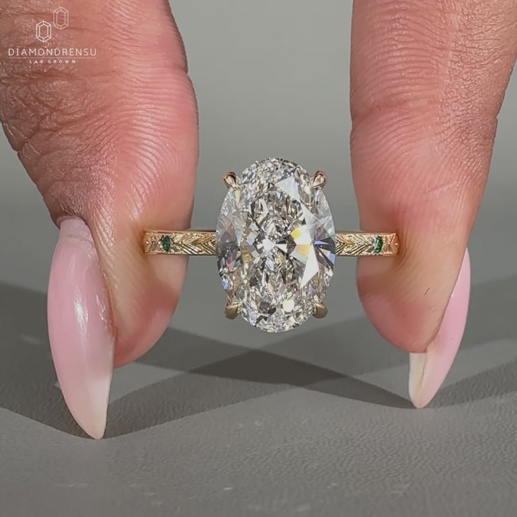Tapered shank engagement ring crafted in yellow gold with elegant detail.

