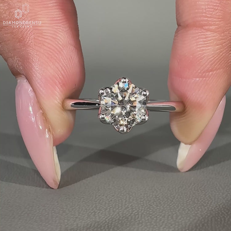 Bridge accent ring setting with tapered shank ring.
