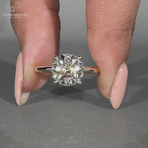 Old European cut round ring solitaire four prong setting.