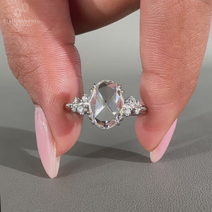 Handmade oval rose cut diamond ring in cluster setting.
