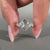 Handmade oval rose cut diamond ring in cluster setting.
