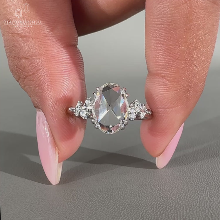 Handmade oval rose cut diamond ring in cluster setting.
