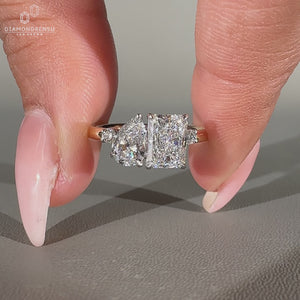 Pear radiant diamond ring two stone split shank design.
