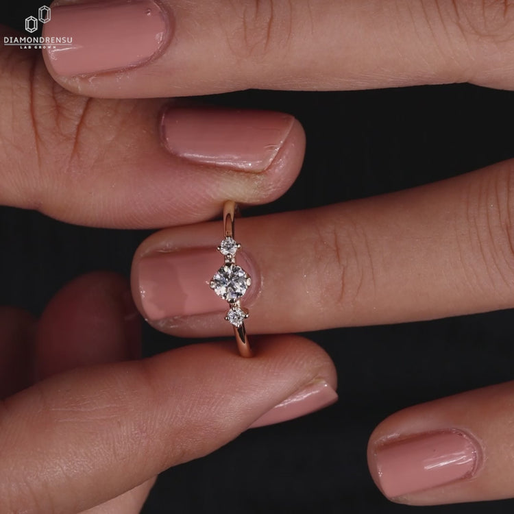 Round diamond ring compass prong setting design.