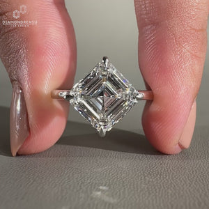 Simple engagement ring made with Asscher cut diamond ring.
