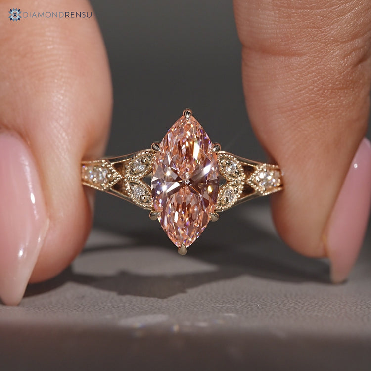 Marquise diamond ring with six claw prong setting.