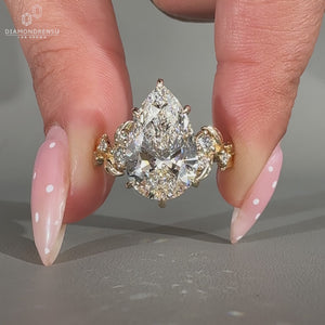 Nature inspired Pear Cut Diamond Engagement Ring.

