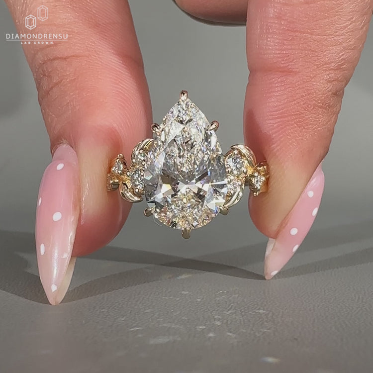 Nature inspired Pear Cut Diamond Engagement Ring.
