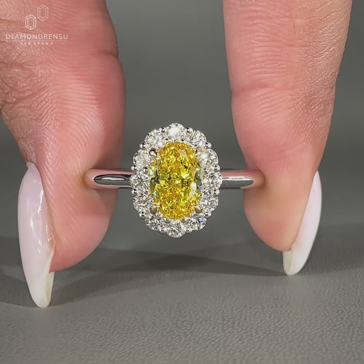 Canary yellow oval diamond ring design.
