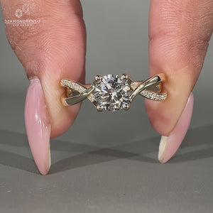 Twisted pavé engagement ring with fine detailing.
