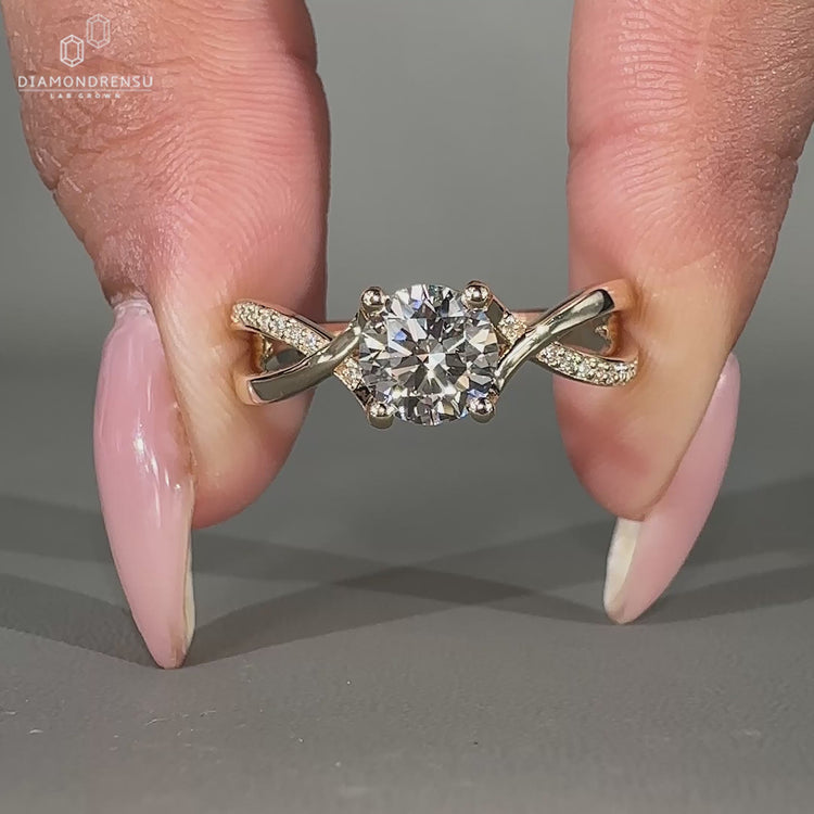 Twisted pavé engagement ring with fine detailing.
