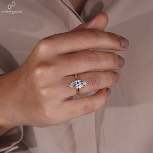 Solitaire engagement ring crafted in yellow gold with a clean design.
