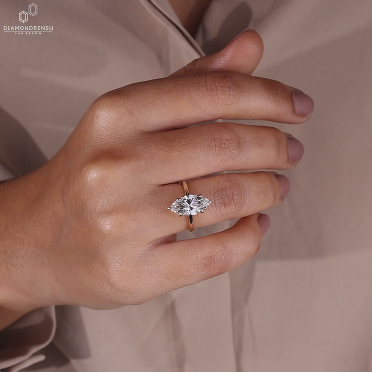 Solitaire engagement ring crafted in yellow gold with a clean design.
